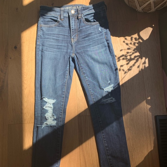 american eagle ne(x)t level stretch dark wash ripped jeans (size 2) - Picture 1 of 5
